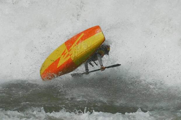 Sadat Kawawa rides the White Nile rapids in a kayak.