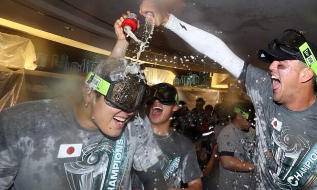 shohei ohtani celebrates japan win locker room keith olbermann cold take