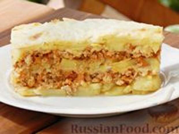 Фото к рецепту: Картофель, запечённый с фаршем и сыром