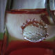A close-up of the marble inside the bottle.