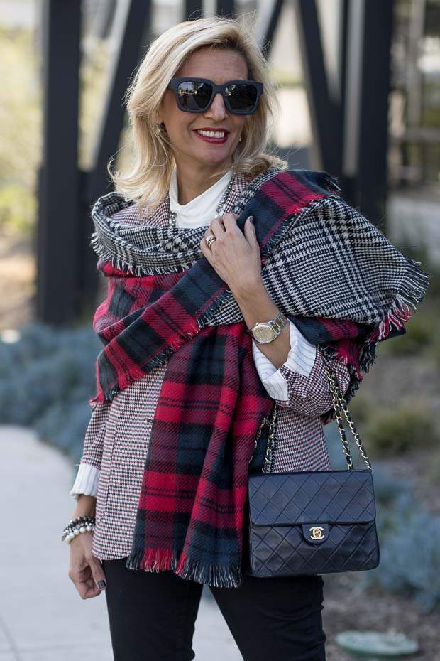 red ivory and black houndstooth blazer for women worn with reversible red black and gray plaid shawl 
