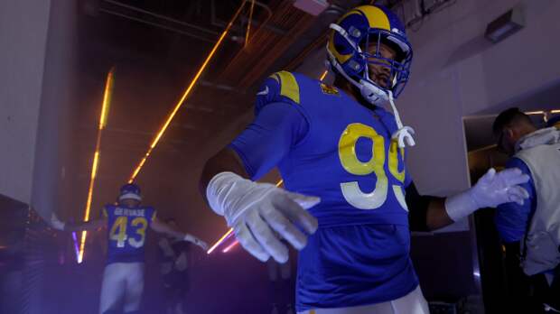 Aaron Donald walks out of the tunnel.