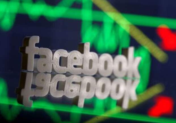 A 3D-printed Facebook logo is seen in front of displayed stock graph in this illustration photo, March 20, 2018. Picture taken March 20. REUTERS/Dado Ruvic
