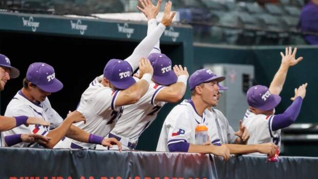 The TCU baseball team celebrates.