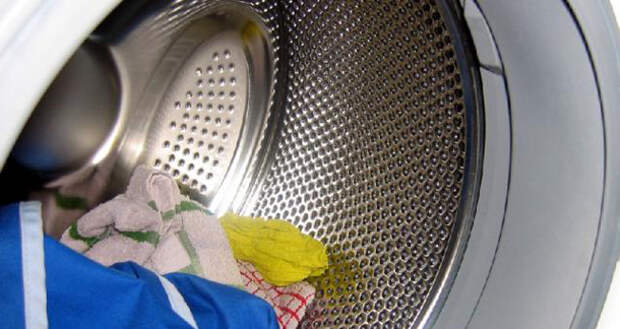 Барабан стиральной машины с бельем