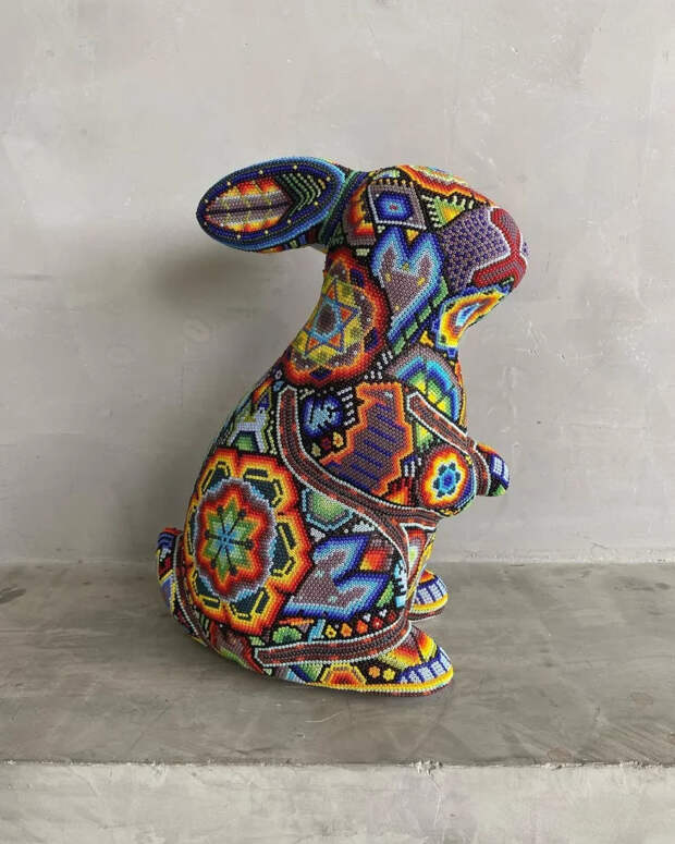 Made this rabbit sculpture carved in wood and decorated v0 gly7wyjzubzb1