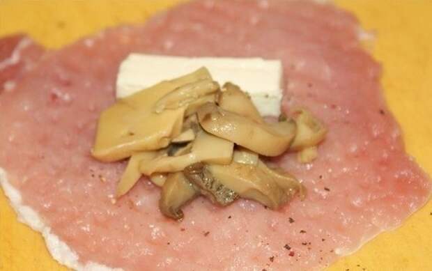 Фото к рецепту: Мешочки с сыром и грибами