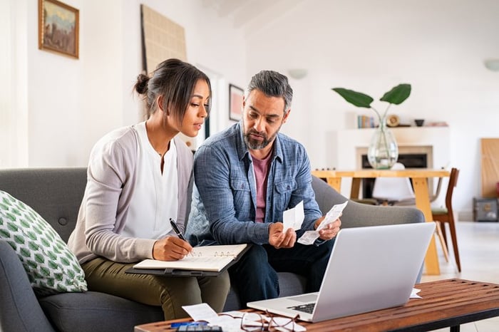 Couple working on taxes.