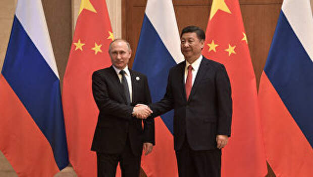 Президент РФ Владимир Путин и председатель Китайской Народной Республики Си Цзиньпин. Архивное фото