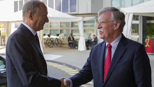 Секретарь Совета безопасности Николай Патрушев и советник президента США по нацбезопасности Джон Болтон во время встречи в Женеве. 23 августа 2018