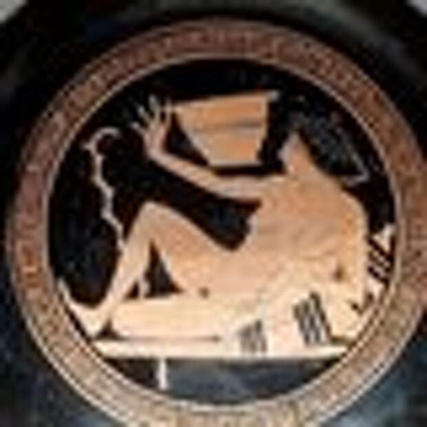 A reclined player getting ready to fling some wine.
