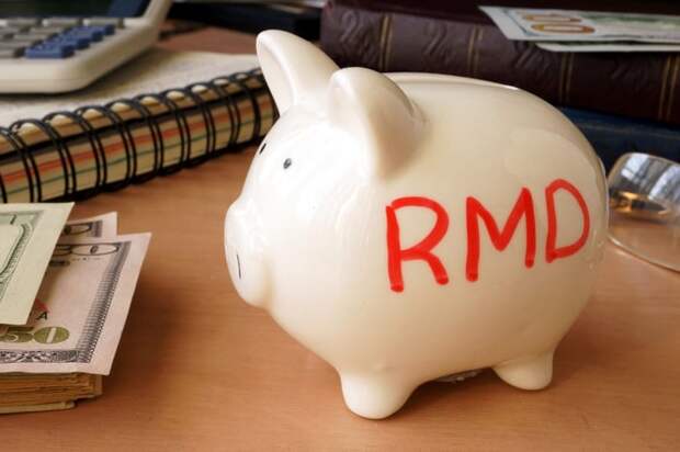 A piggy bank with the letters RMD written on it.