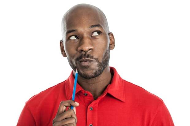 Someone in a red short is looking upward, deep in thought.