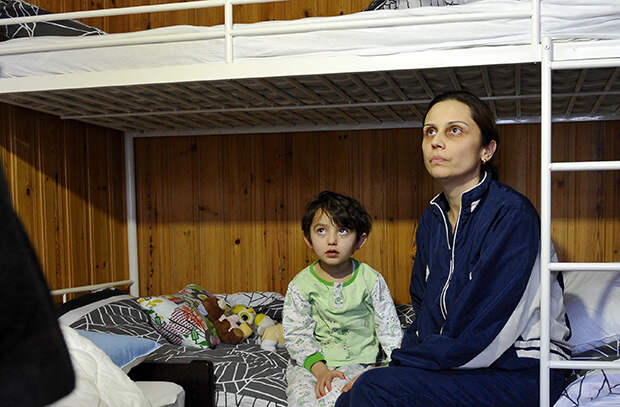 Мигранты из Сирии в лагере для беженцев. Фото: Лев Федосеев/ТАСС