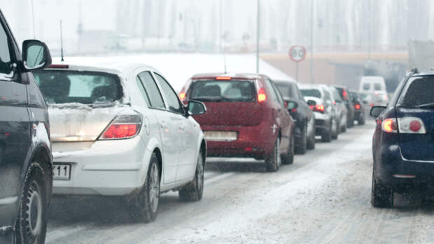 traffic jam in the city at winter time