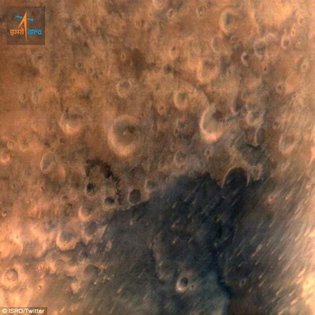 Last month, India's first mission to Mars, the ISRO's Mars Orbiter, arrived at Mars and released its first image (shown) of the red planet's surface. 'Howdy @MarsCuriosity? Keep in touch. I'll be around' the team for the orbiter tweeted on its arrival