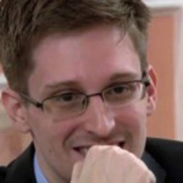 In this image made from video released by WikiLeaks on Friday, Oct. 11, 2013, former National Security Agency systems analyst Edward Snowden smiles during a presentation ceremony for the Sam Adams Award in Moscow, Russia. Snowden was awarded the Sam Adams Award, according to videos released by the organization WikiLeaks. The award ceremony was attended by three previous recipients. Snowden, who is charged by a U.S. court with violating the Espionage Act for disclosing the classified NSA programs, has been granted asylum in Russia. (AP Photo)