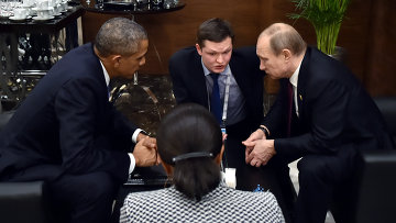 Президент России Владимир Путин во время беседы с президентом США Бараком Обамой на полях саммита Группы двадцати (G20). Архивное фото