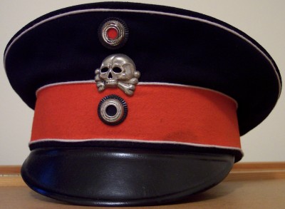 фуражка.jpg Немного о происхождении символики бандеровцев.