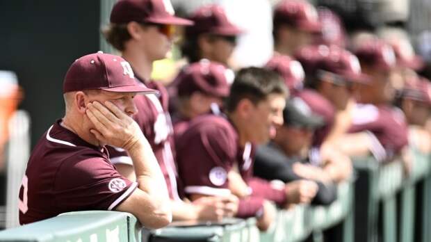 Texas A&M head baseball coach Jim Schlossnagle in the Aggies dugout.