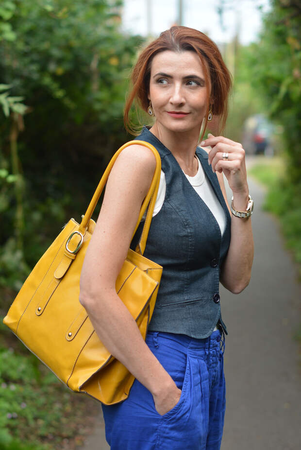 Not Dressed As Lamb: Vest/waistcoat with loose blue trousers, yellow tote