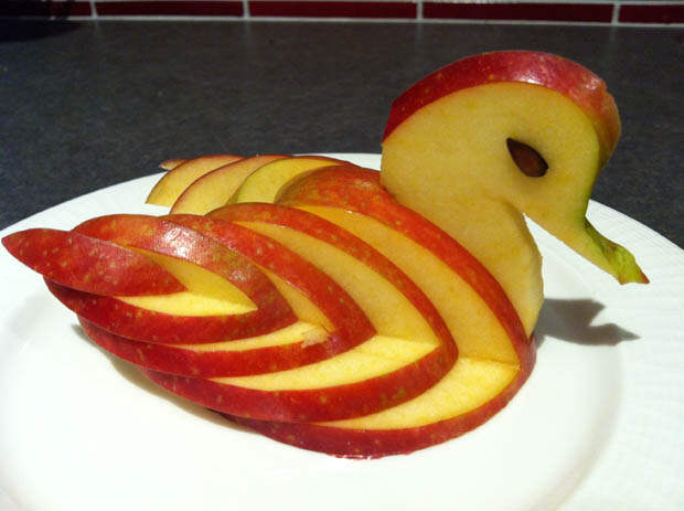 swan apple carving