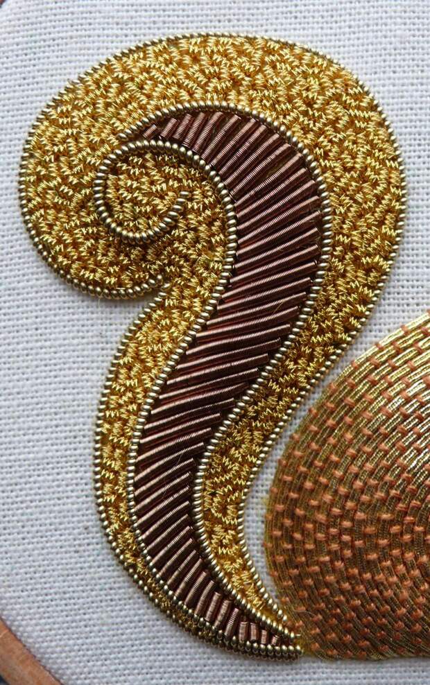 Work a metal thread embroidery Red Squirrel, in gold and copper/brown threads.: 