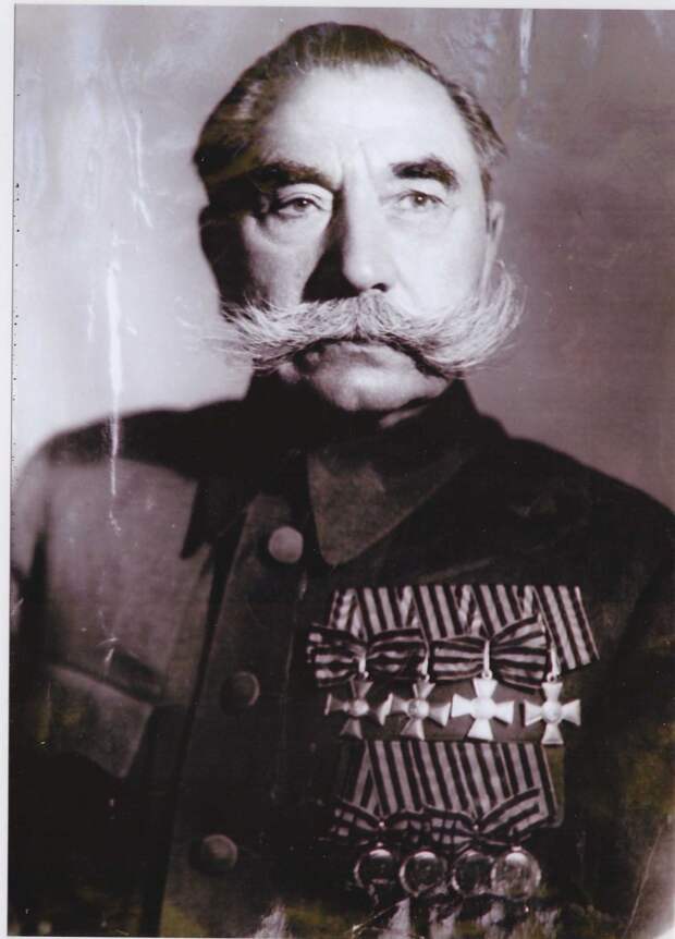 Маршал Советского Союза Будённый С. М. во френче с царскими наградами