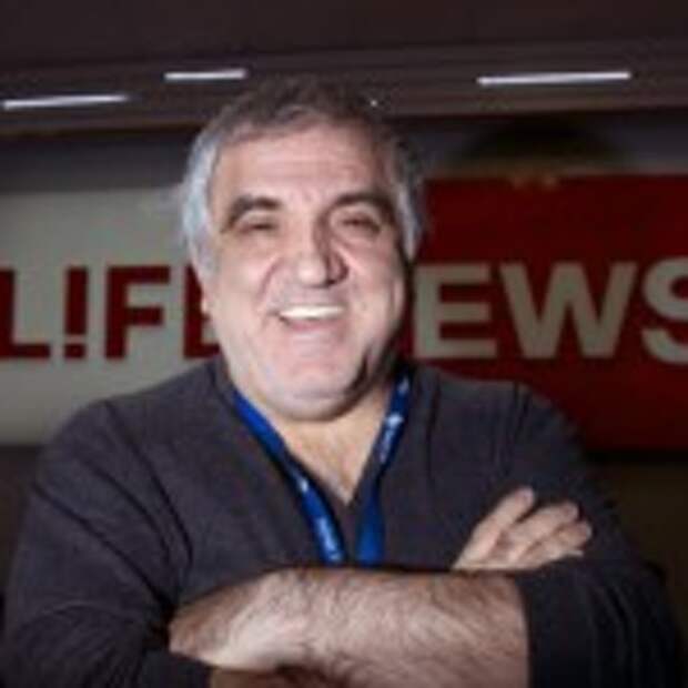 Aram Gabrelyanov, Lifenews owner, smiles during the interview to The Associated Press in the company headquarters in Moscow on Monday, Oct. 14, 2013. Now the Gabrelyanovs company, News Media Holding, earns $1.5 billion per year. In addition to Life, they own Izvestia, once the official newspaper of the Soviet government, as well as two tabloids and three websites. The younger son and inheritor of the empire, 24-year-old Ashot, runs Lifenews.ru as well as a new TV station. There is no substantive division between the holdings publications, which freely feed one another information and scoops, which are then retailored for each audience. The elder son, 26-year-old Artem, directs their comic book line, with a host of Russified superheroes that includes an Orthodox priest. (AP Photo/Ivan Sekretarev)