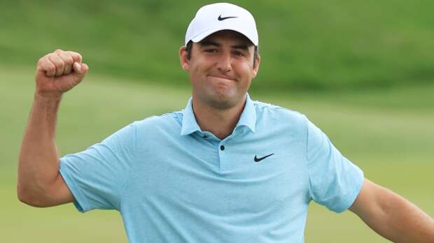 Scottie Scheffler celebrates after winning The Players Championship