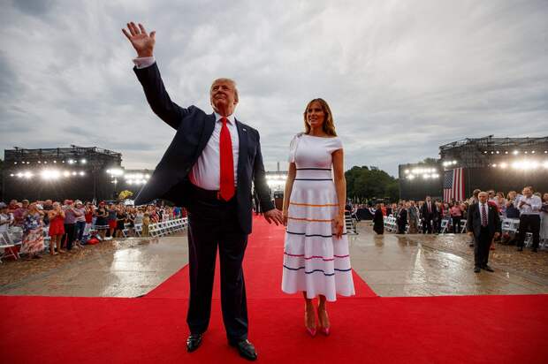 President Donald Trump and first lady Melania Trump leave an Independence Day, July 4, 2019, in Washington.  Carolyn Kaster, AP.png