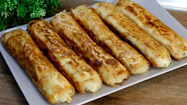 Сегодня делюсь безумно вкусным рецептом завтрака из лаваша. Готовится всё за считанные минуты, но приготовив такие трубочки хотя бы один раз, будете делать их постоянно.-11