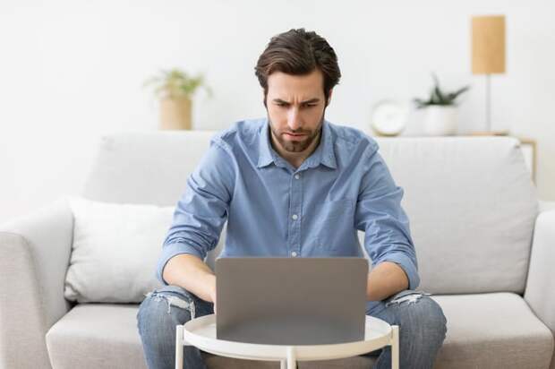 A person at a laptop.