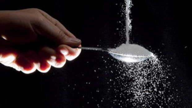 Sugar is poured on a tablespoon in a photo illustration in North Vancouver, B.C. Wednesday, Sept. 21, 2011.THE CANADIAN PRESS/Jonathan Hayward ORG XMIT: CPT110