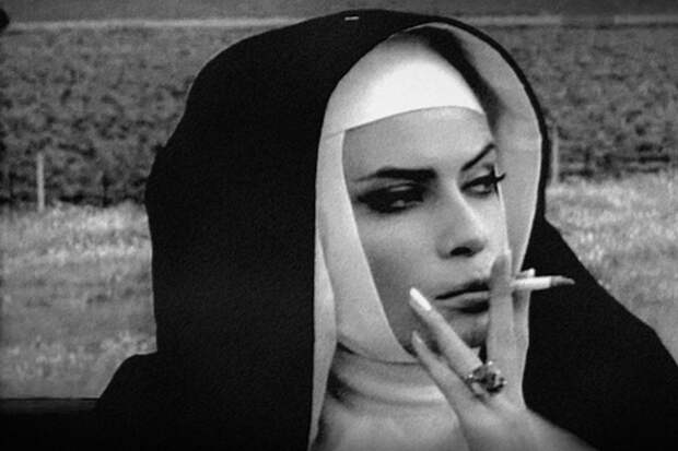 Marisa_Mell_smoking_-_dressed_as_a_nun_