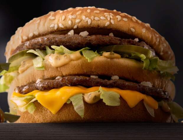 The Grand Big Mac is made with two 1/6th-pound patties and two slices of American cheese served on a larger sesame seed bun with lettuce, onions and pickles. The giant burger is a hefty 890 calories.
