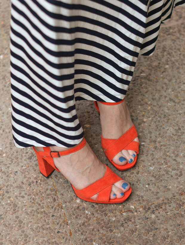 Black and white striped maxi skirt, orange strappy heels