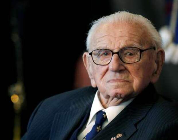 FILE - In this file photo dated Tuesday, Oct. 28, 2014, 105-year old Sir Nicholas Winton waits to be decorated with the highest Czech Republic's decoration, The Order of the White Lion at the Prague Castle in Prague, Czech Republic. Winton died Wednesday July 1, 2015 aged 106. As a young stockbroker in Prague Winton watched as Nazis marched into Czechoslovakia, but then virtually single-handedly saved more than 650 Jewish children from almost certain death, but he never told his story until his wife discovered documents in their attic that revealed the story and for the first time allowed the rescued children to know and thank their savior. (AP Photo/Petr David Josek, FILE)
