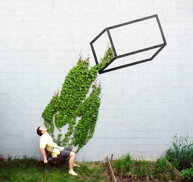 funny-street-art-man-bush-wall-green