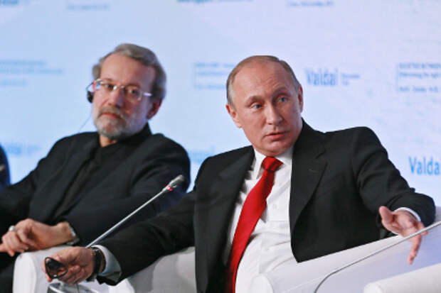 Али Лариджани (слева) и Владимир Путин на заседании дискуссионного клуба «Валдай» в Сочи