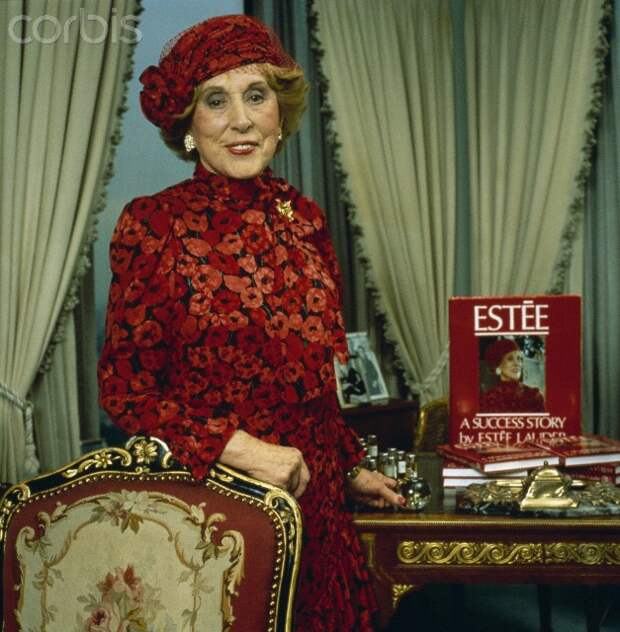 Estee Lauder with Copies of Her Book