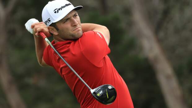 Jon Rahm tees off.