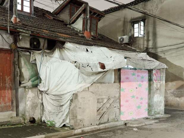 Трущобы упрямых китайцев, отказывающихся переселяться в квартиры (23 фото)
