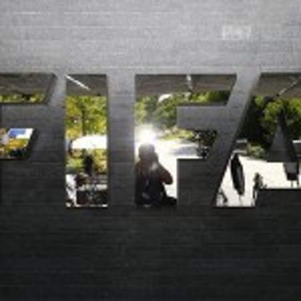 The logo of FIFA is seen in front of its headquarters in Zurich, Switzerland July 20, 2015. REUTERS/Arnd Wiegmann