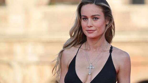 brie larson wearing a black dress in rome
