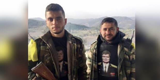 Сирийские ополченцы воюют с боевиками в футболках с портретом погибшего пилота Су-24