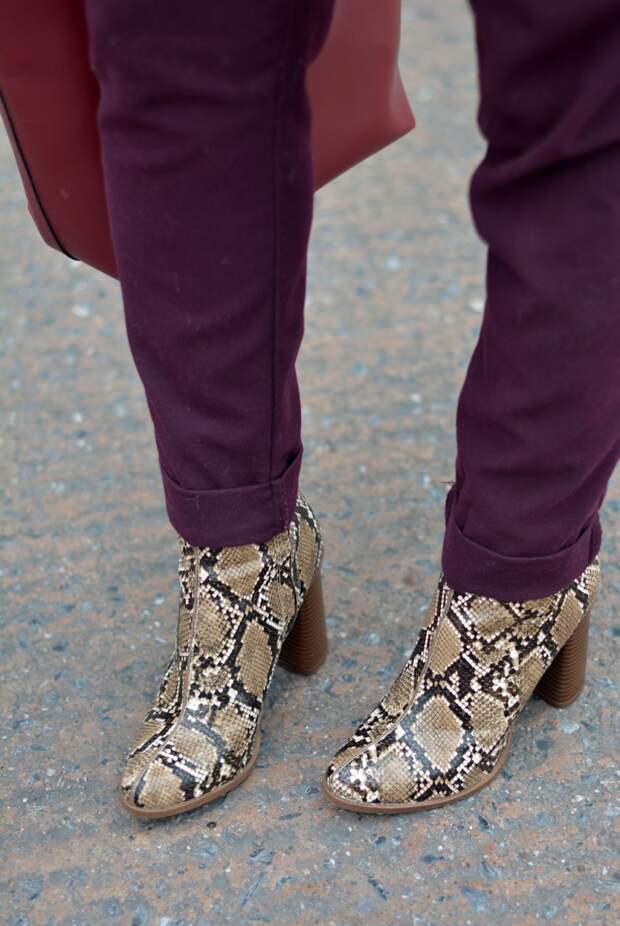 Purple trousers, red bucket bag, snakeskin boots
