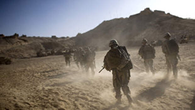 Военнослужащие США возвращаются в форпост после патрулирования в провинции Кандагар, Афганистан