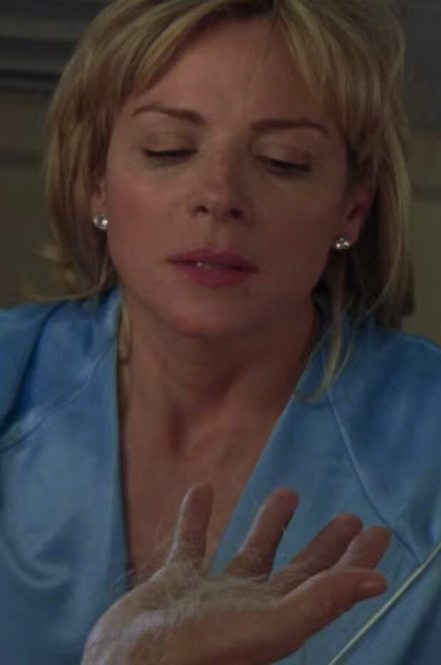 Samantha's hair starts falling out as a result of chemo.