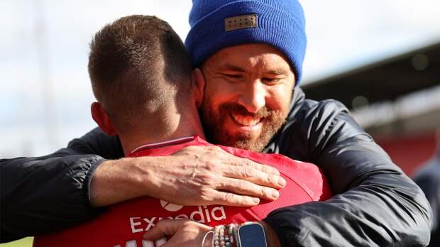 Ryan Reynolds hugs Wrexham star Paul Mullin